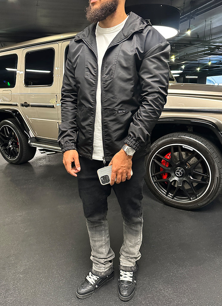 Hooded Windbreaker Jacket | Lightweight Protection | Sleek and Stylish